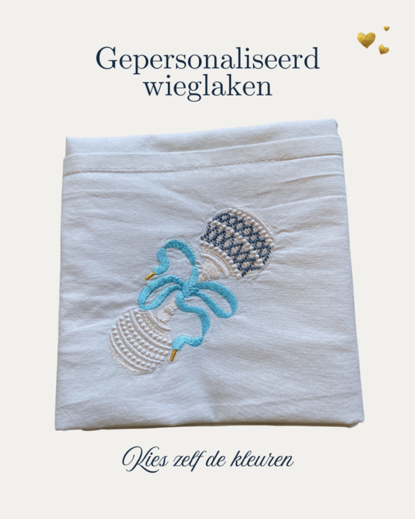 Wieglaken blauwe veter rammelaar kleur